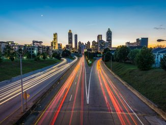 timelapse photo of highway during golden hour