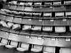 brown wooden chairs on gray concrete floor