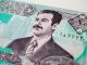 a portrait of a man on a five dollar bill