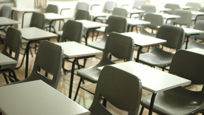 Photo by MChe Lee white table with black chairs