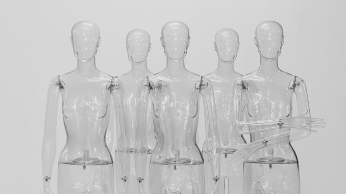 Photo by Anh Tuan To clear glass bottles on white background