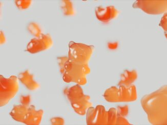 a group of gummy bears floating in the air