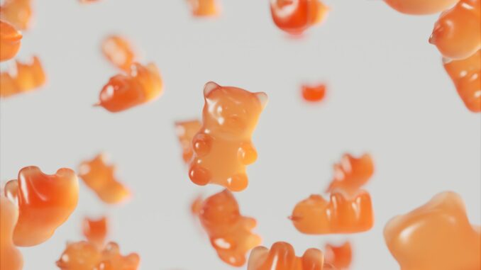 a group of gummy bears floating in the air
