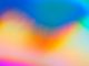 a blurry image of a rainbow colored background