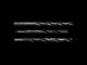 grayscale photo of drill bits